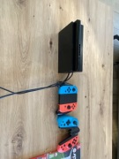 Nintendo Switch + joysticki + gry