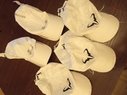 Czapki z daszkiem tenisowe Nike Artengo Under Armour 