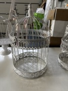 Białe klatki dekoracyjne w stylu vintage, lampiony, wesela