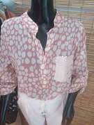 Elegancka bluzka z ozdobną kieszenią w cekiny