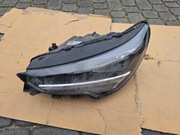 9829465580 reflektor corsa f przód lewy