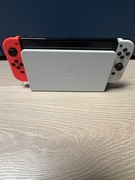 Nintendo Switch OLED + etui, karta 128 / używany, idealny