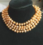 Jasno pomarańczowe perły naturalne, długi naszyjnik, sznur pereł