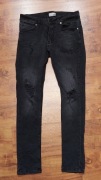 Spodnie Skinny fit DeFacto z dziurami