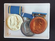 Medal Pestalozziego za Wierną Służbę, brązowy, złoty i srebrny.