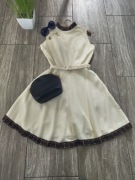 Elegancka sukienka vintage lata z koronkowym wykończeniem 60's retro pin-up