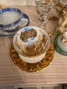 Filiżanka ze spodkiem, motyw Heidelberg, W. Germany, złocenia