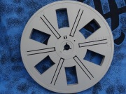 Szpula 25 cm EUMIG na taśma filmowa S.8 otwór na trzpień 12,7mm PUSTA