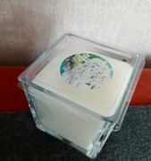 Świeczka biała w szklanym słoiku. 