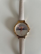 Złota koperta złoty zegarek skórzany pasek biała tarcza flaming Parfois