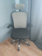 Fotel biurowy obrotowy z regulowanym zagłówkiem oraz odc. lędźwiowym