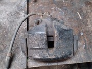 Zacisk lewy przedni Octavia II Audi A3 8P Golf V tarcza 288mm z jarzmem