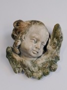 Anioł barokowy z konglomeratu 