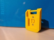 Uchwyt baterii DeWalt z blokadą.