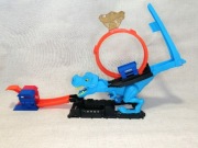 Hot Wheels City Pętla T-Rexa Zestaw z pętlą i starciem z dużym dinozaurem