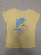 Żółta bawełniana bluzka magiczne cekiny delfin ryba rybka H&M 134 140