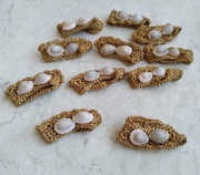 Materiałowe obrączki na serwetki z muszelkami