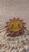 Przypinka słońce ok 2x2 cm