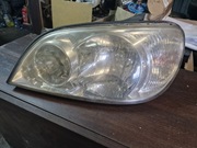 Lewy reflektor kia carnival 1 