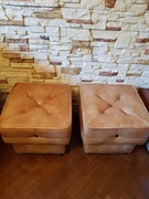 Dwie pufy tapicerowane skórą naturalną 