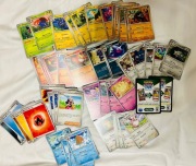 50 oryginalnych kart pokemon + 2 holo + 5 energii + 2 Kody do gry online