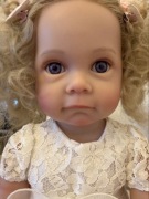 Cudna laleczka reborn w koronkowej sukience lalka realistyczna