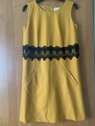 Ciemnożółta wełniana sukienka Bialcon bez rękawów rozmiar 36/38.