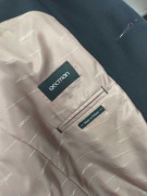 Czarny, prosty garnitur marki Recman, używany. Stan bardzo dobry++