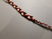 Bransoletka warkocz czerwona