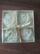 Świeczki róże w uszkodzonym pudełku 