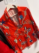 Czerwona bluzka z długim rękawem i wzorem marynarskim - Shein rozm. M