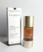 Clarins samopalacz do twarzy Golden Glow Booster 
