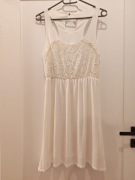 Biała sukienka z koronkową górą i halką