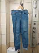 Spodnie jeansowe Denim  dla dziewczynki chłopca rozmiar 134 niebieskie elas