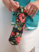 Torebka pokrowiec trzymadelko na butelke wody sznurek przez ramię hand made