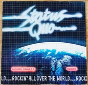 STATUS QUO ROCKIN' ALL OVER THE WORLD LP WINYL EXC-