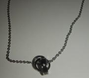 Naszyjnik łańcuszek z 3 pierścionkami z napisem The only eternal love