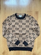 Sweter we wzorki CC