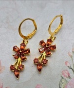 Kwiatki kwiaty kwiatuszki złote kolczyki kryształki cyrkonie modne glamour