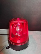 Czerwona obrotowa lampa ostrzegawcza, powszechnie znana jako "kogut"