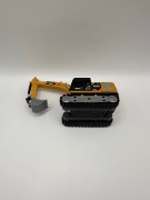 Miniaturowa, zdalnie sterowana koparka gąsienicowa