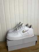 Buty używane Nike Air Force 1 Low org białe skorzane 38,5