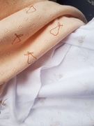 Dzianina jersey pointoille dla dzieci brzoskwinia materiał koszulka0,5mb 