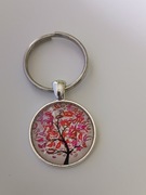 Brelok , breloczek , wypukłe szkło..