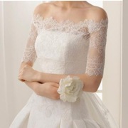 Koronkowe bolerko ślubne