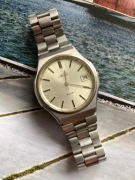 Stary zegarek kwarcowy Novus ,stalowy 35mm sprawny 