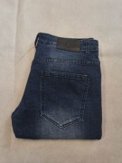 Spodnie jeansowe New Boy 33 pas 88-90 cm