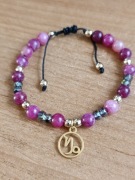 Turmalin różowy ze znakiem Koziorożca.