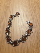 Srebrna bransoletka z bursztynami. Srebro próba 925