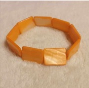 Bransoletka z masy perłowej pomarańczowa 